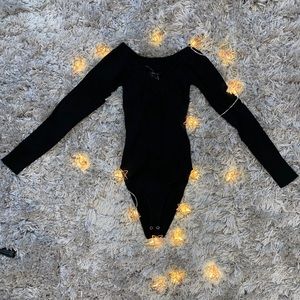 Black knitted body suit